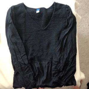 Black ruffle bottom shirt